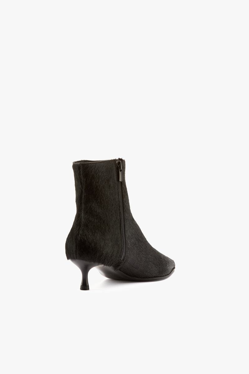 Tronchetto cavallino nero